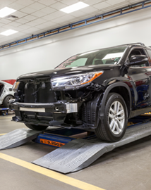 Toyota on vehicle lift | Crown Toyota in Ontario CA